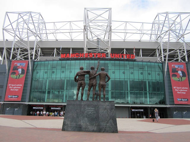 The Munich Air Disaster 'United Trinity' statue outside the main entrance of Old Trafford stadium, Manchester United.